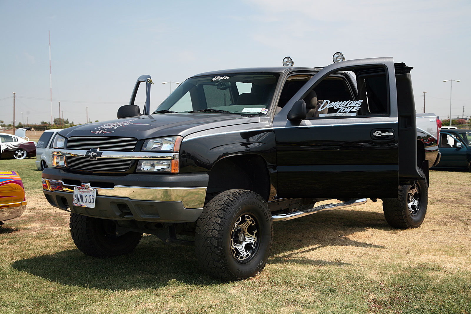 Summer Madness Show Coverage Lifted Chevy Silverado Photo
