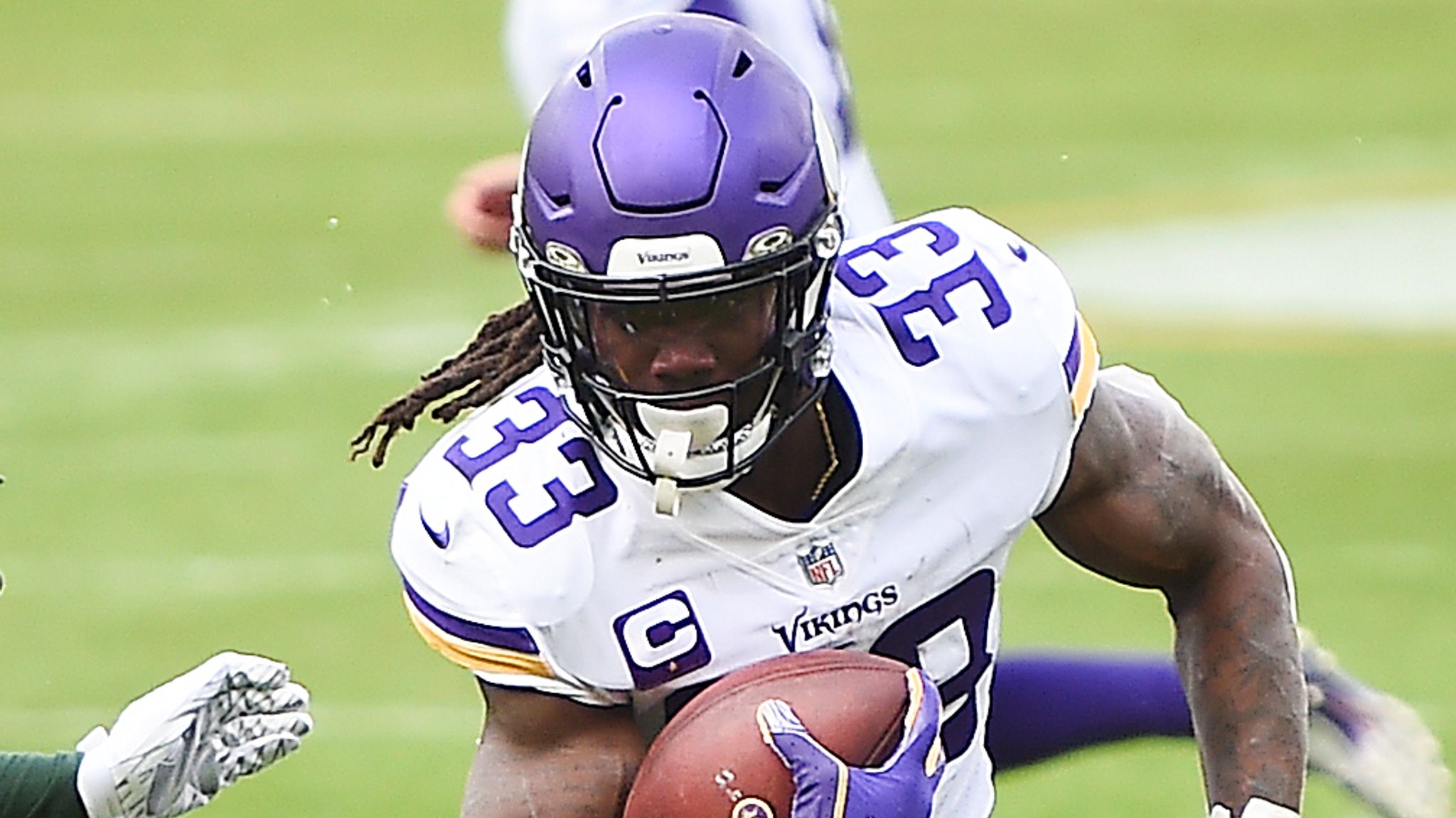 Minnesota Vikings wide receiver Justin Jefferson running with the football during a game