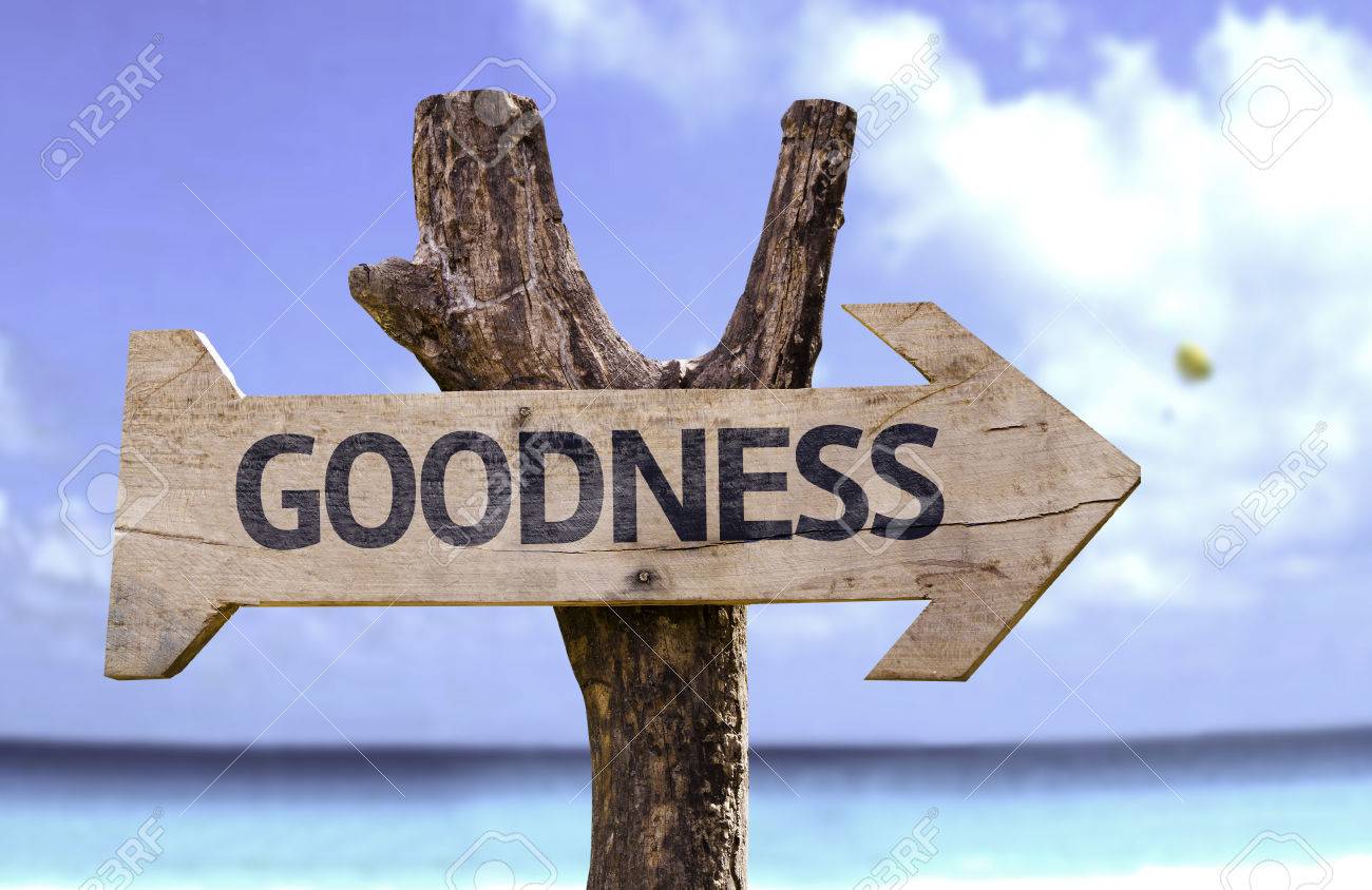 Goodness Sign With Arrow On Beach Background Stock Photo Picture