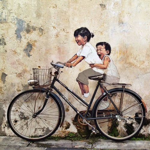 Kids On A Bike Graffiti Wallpaper