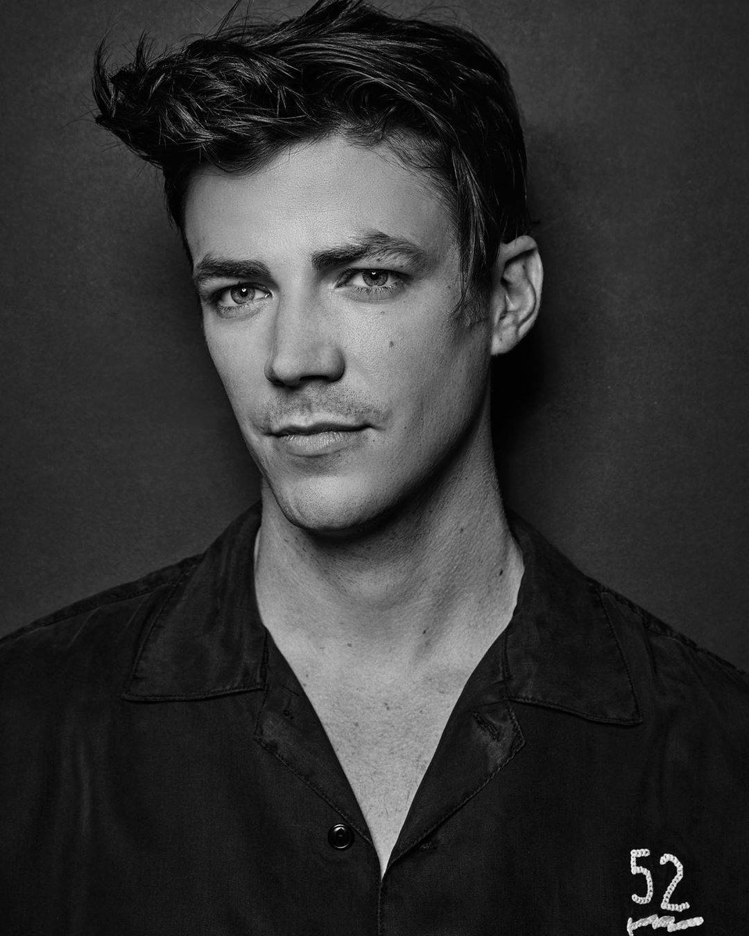Grant Gustin In A Stylish Monochrome Photoshoot Wallpaper