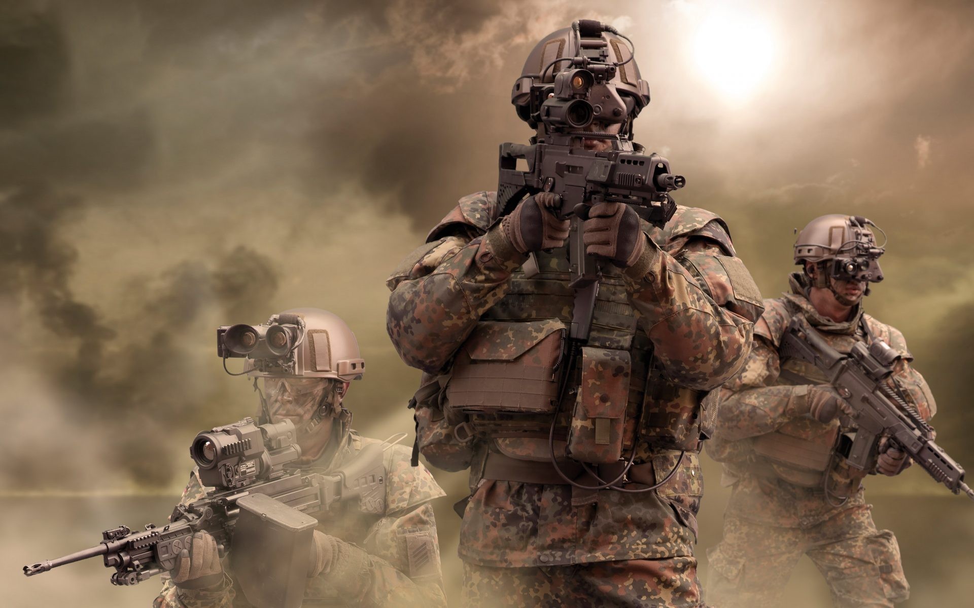Three soldiers in camouflage uniforms and advanced gear, including night vision goggles and modern firearms, stand ready against a smoky battlefield backdrop. This evokes a sense of military preparedness and cutting-edge technology