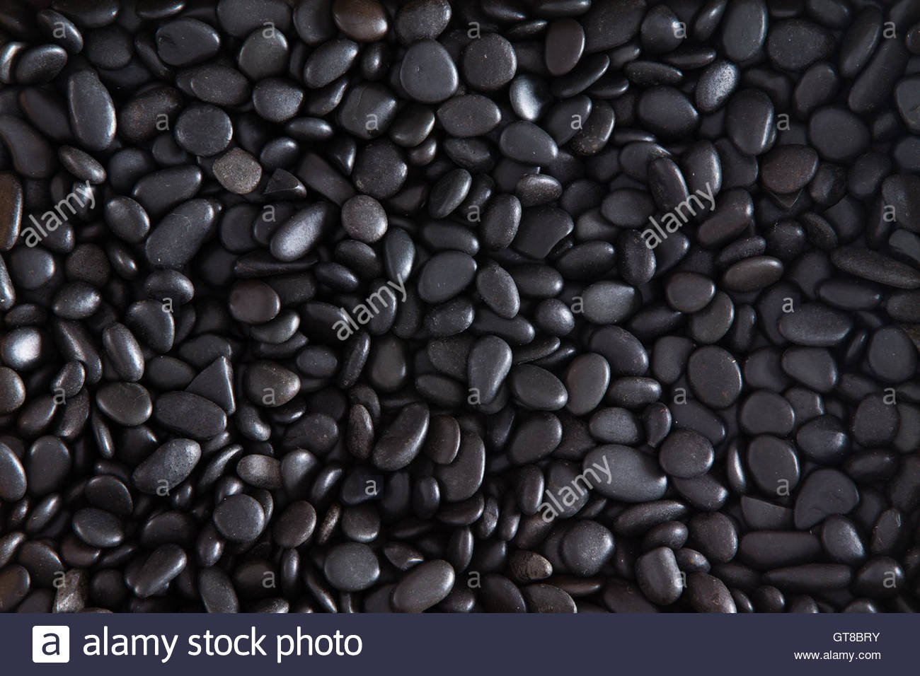 Plenty Of Black Small Pebble Stones For Wallpaper Background