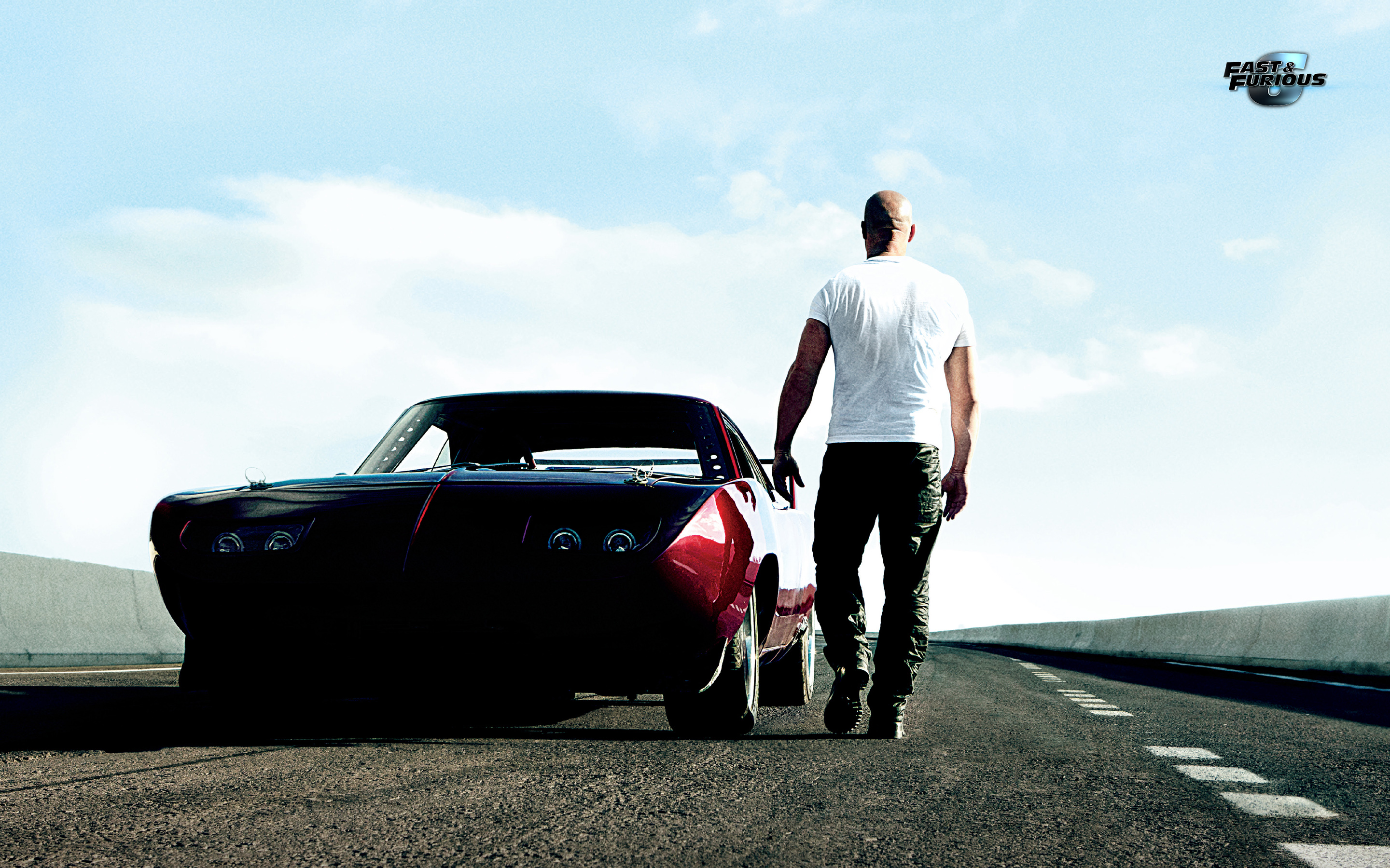 Vin Diesel walking away from a Dodge Charger in Fast & Furious