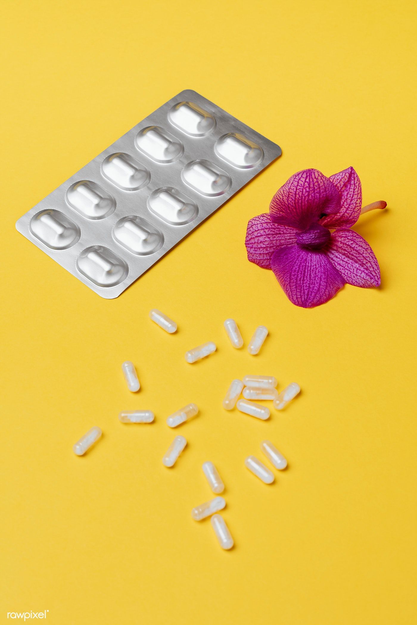 Pills And Medication On A Yellow Background Image By