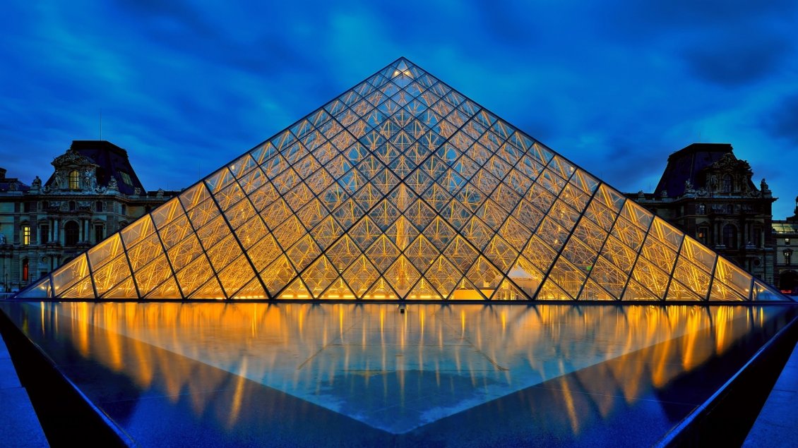 Louvre Museum Pyramid Lighted In Night