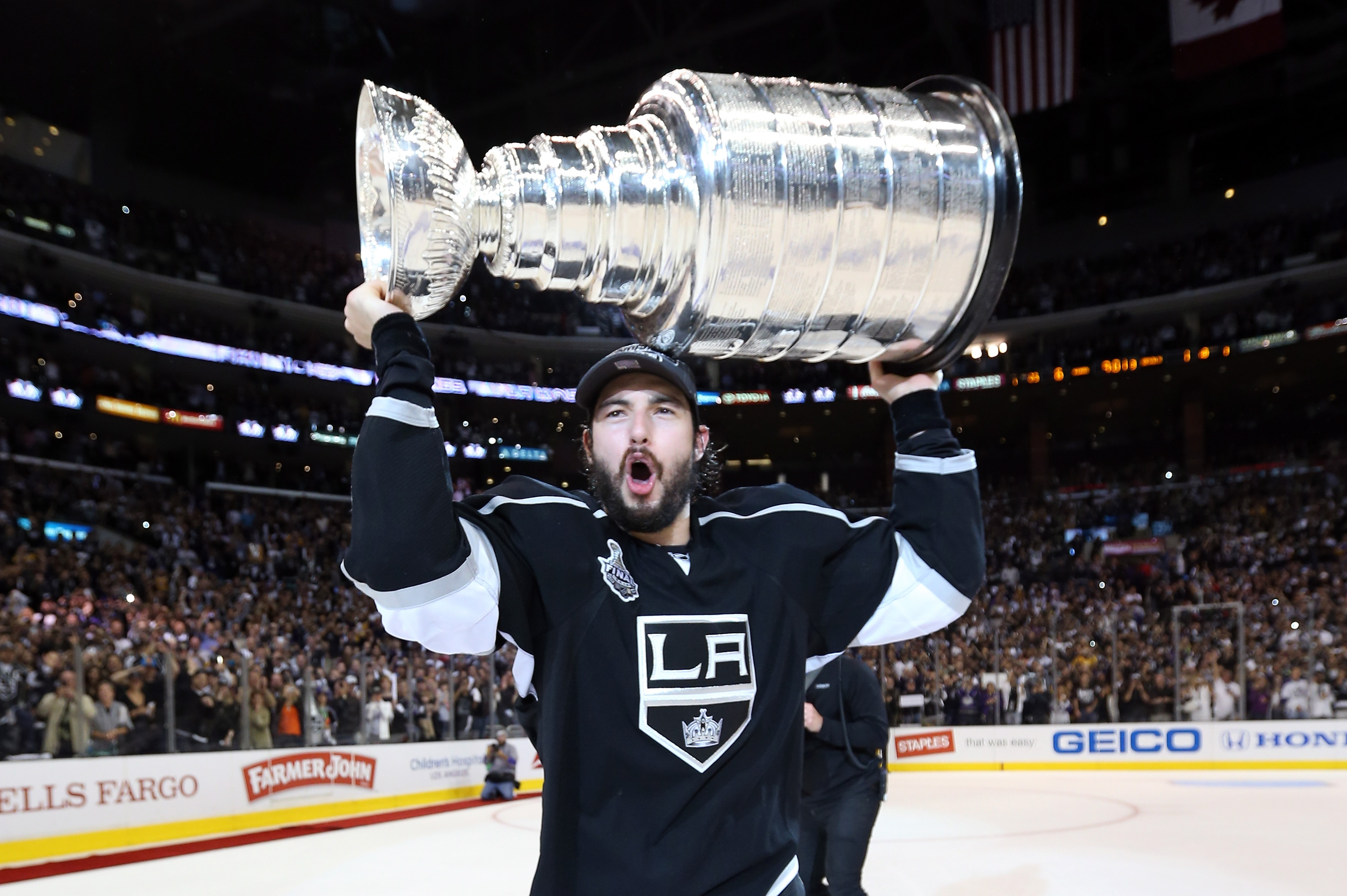 Best Hockey Player Drew Doughty And His Trophy Wallpaper