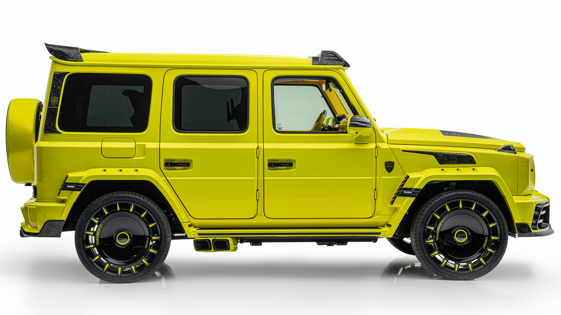 Side view of a lime green Mansory Gronos G-Wagen, a modified Mercedes-Benz G-Class, showcasing its unique body kit, wheels, and exhaust system