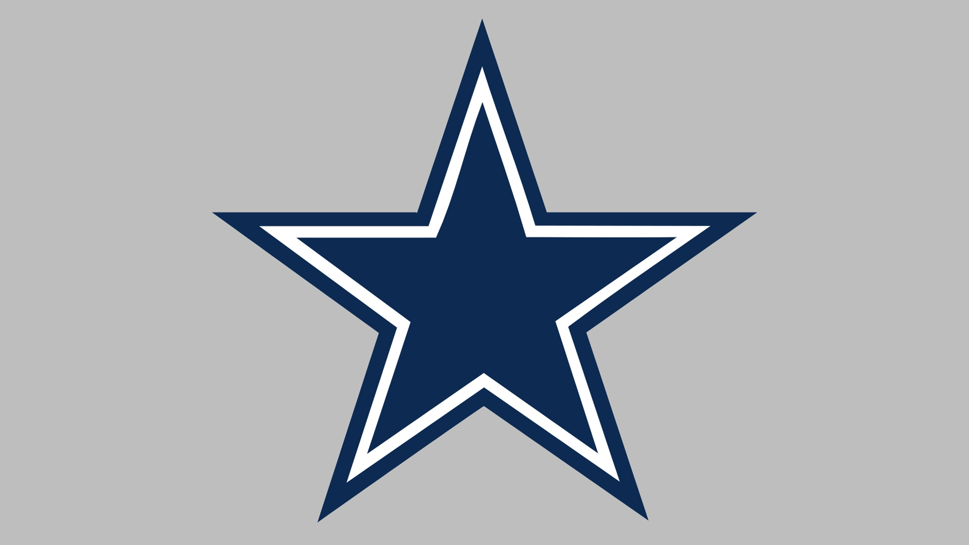 nfl dallas cowboys logo blue on silver grey