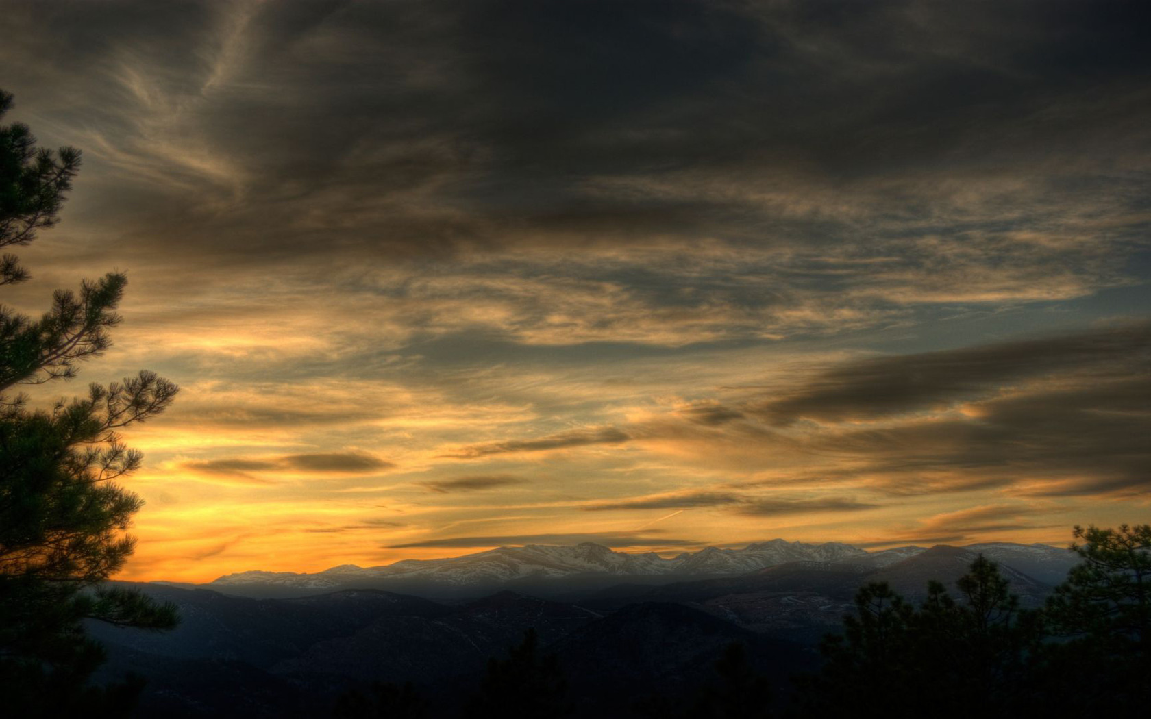 Sunset Over Mountain Peaks Wallpaper