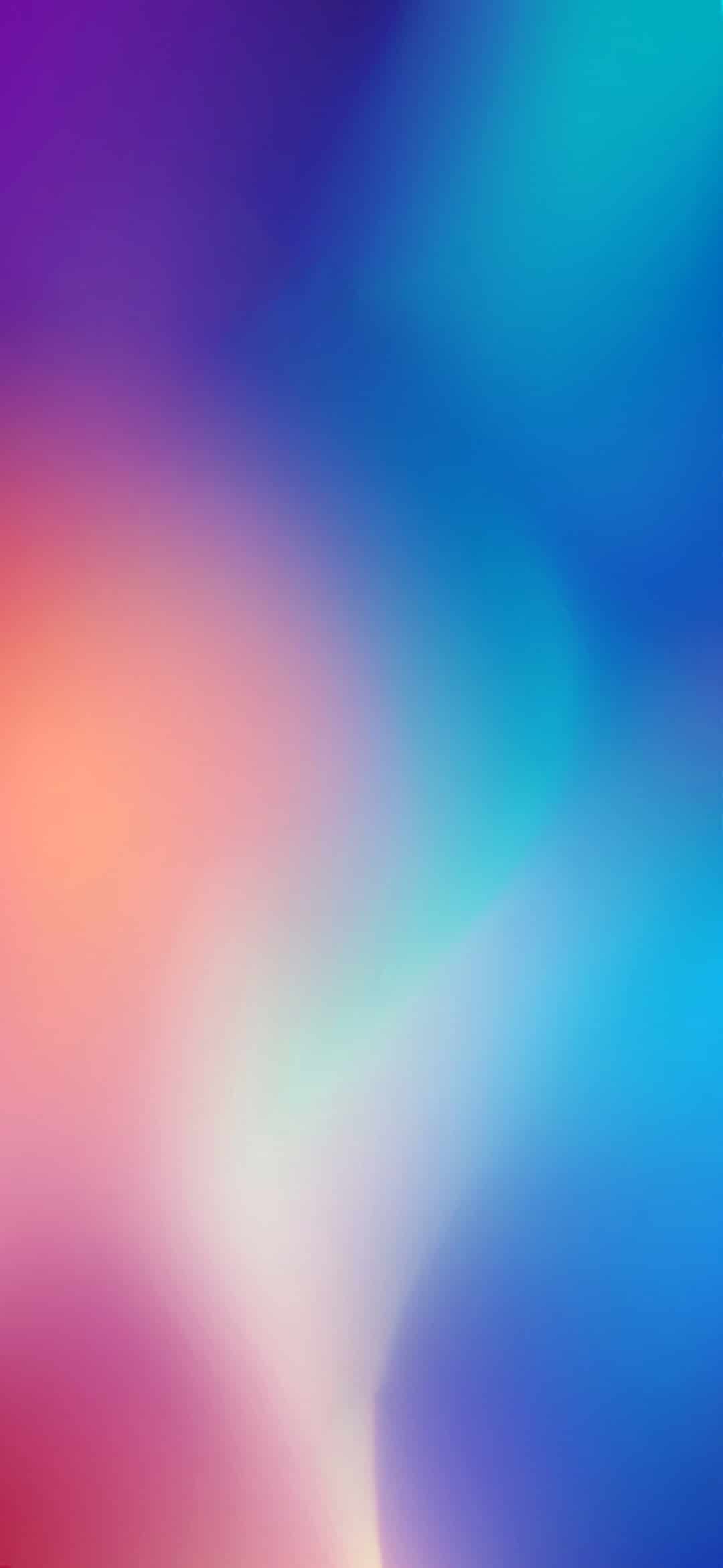 Abstract blurred gradient background in vibrant pink, purple, and blue hues, perfect for a modern and stylish wallpaper