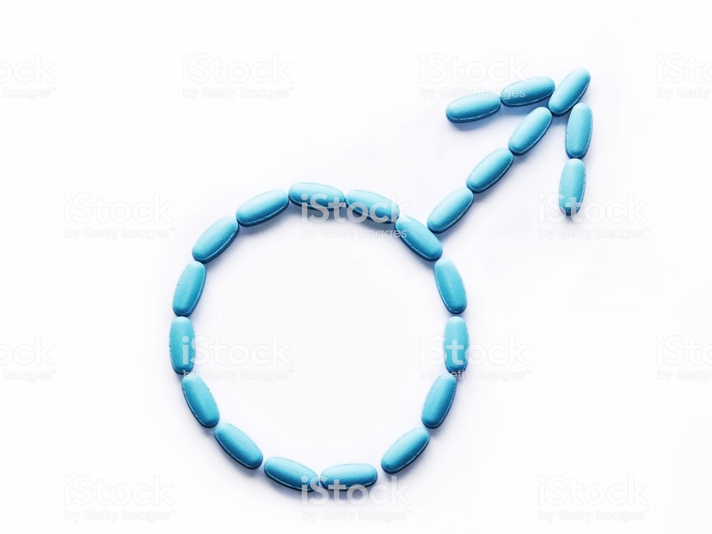 Viagra Pills Are Laid Out In The Symbol Of Masculine An
