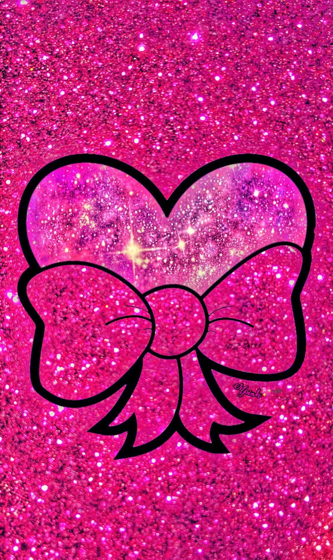 A vibrant pink glitter heart with a galaxy design inside, adorned with a matching glitter bow. Perfect for Valentine's Day or expressing love and affection