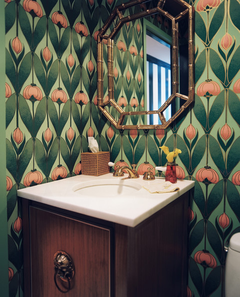 Green Bathroom Floral Wallpaper And A Gold Faux Bamboo Mirror In