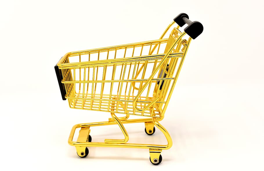 HD Wallpaper Gold Shopping Cart Placed On White Floor Purchasing