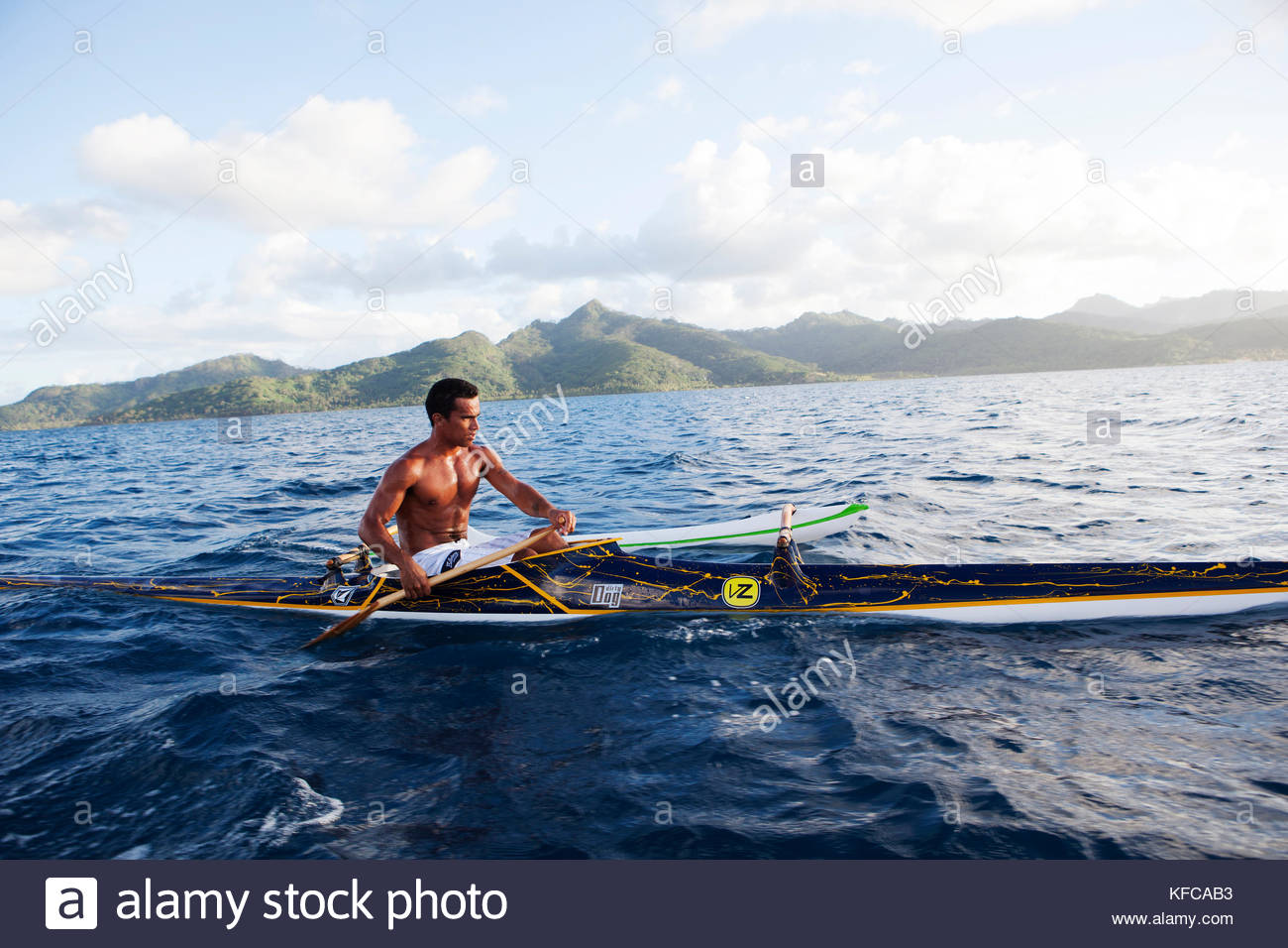 French Polynesia Tahaa Island Roe Riding His Outrigger Canoe