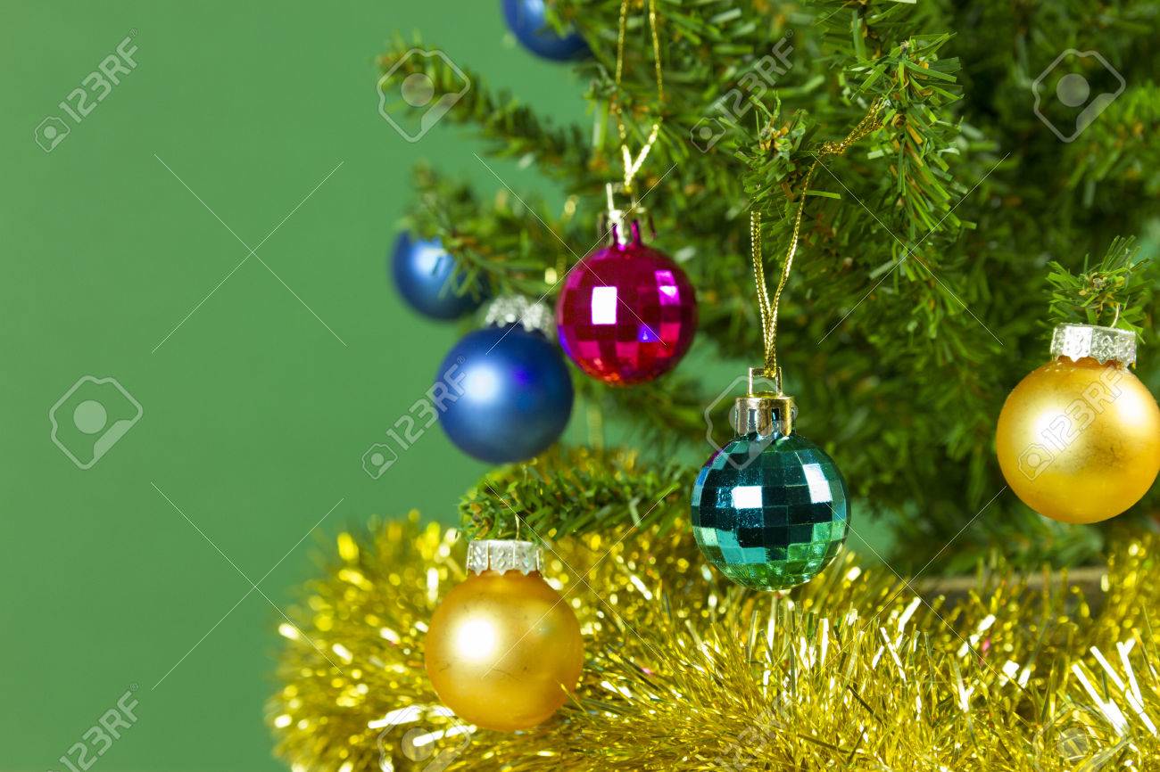 Wallpaper Of Christmas Tree Closeup With Tinsel Multicolor