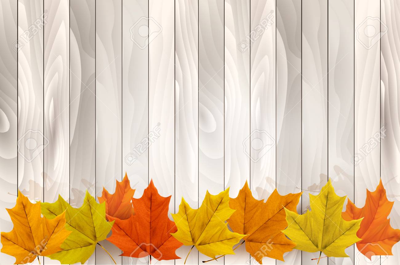 Happy Thanksgiving Background With Colorful Leaves And A Wooden