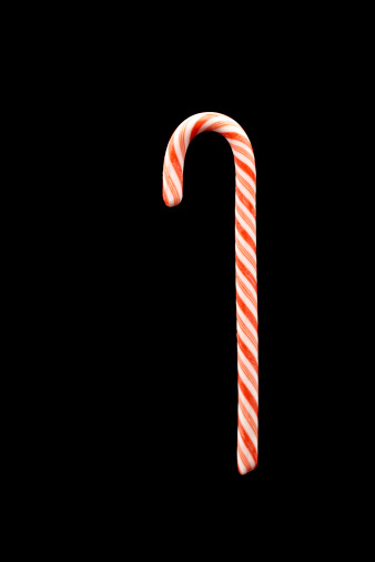 Christmas Candy Cane On A Black Background Stock Photo Getty Images