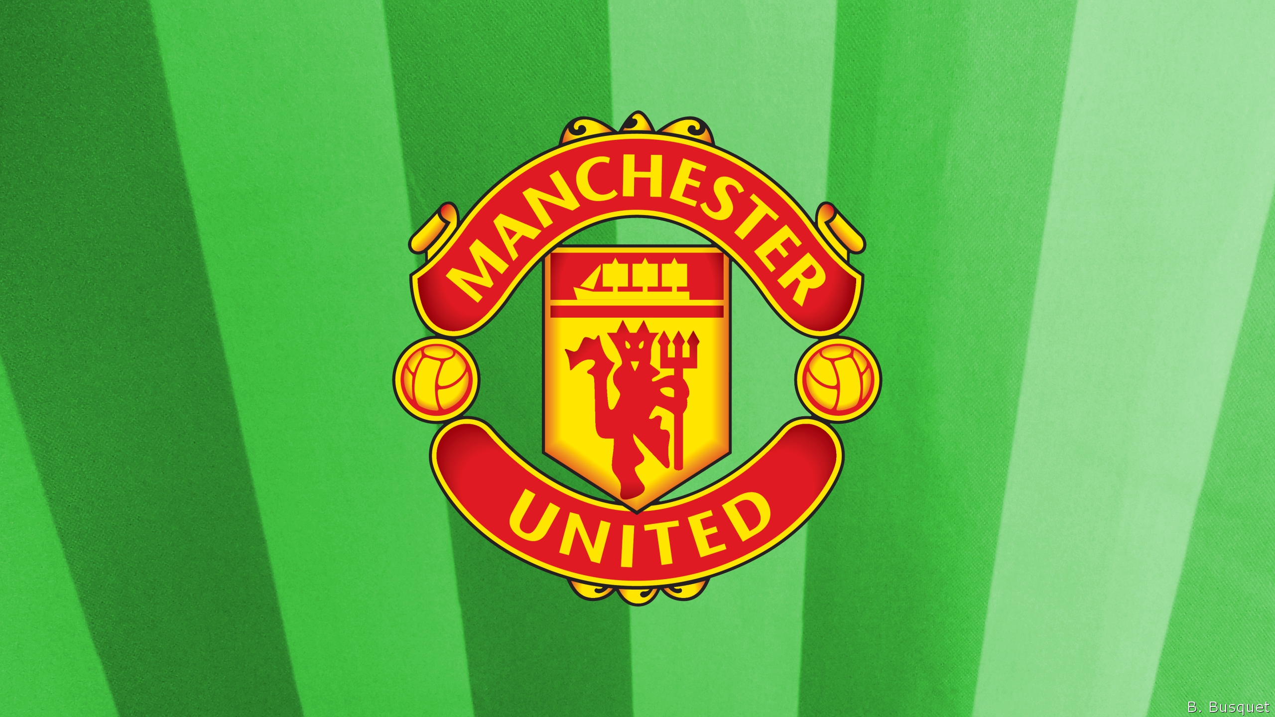 Green Striped Manchester United Wallpaper With The Logo In Center