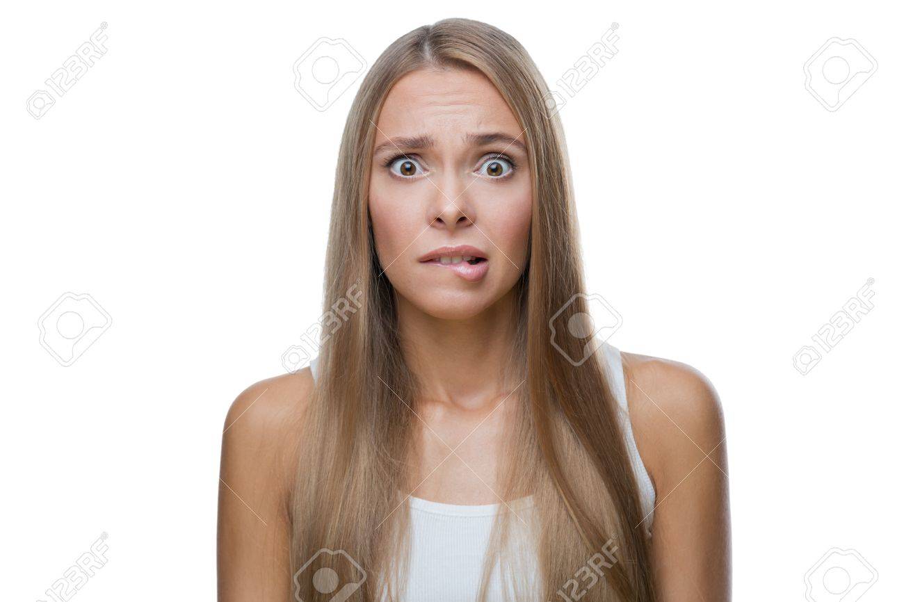 Portrait Of Shocked Beautiful Blond Woman On White Background