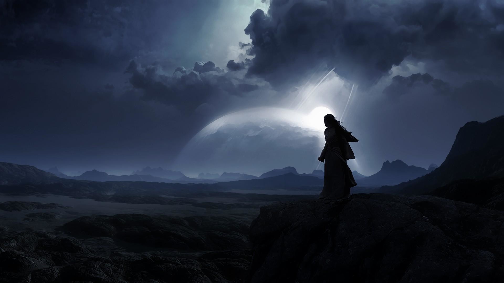 A lone figure silhouetted against a dark, desolate landscape under a stormy sky, evoking feelings of loneliness and despair