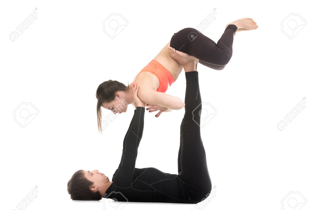 Two Sporty People On White Background Working Out Together Doing