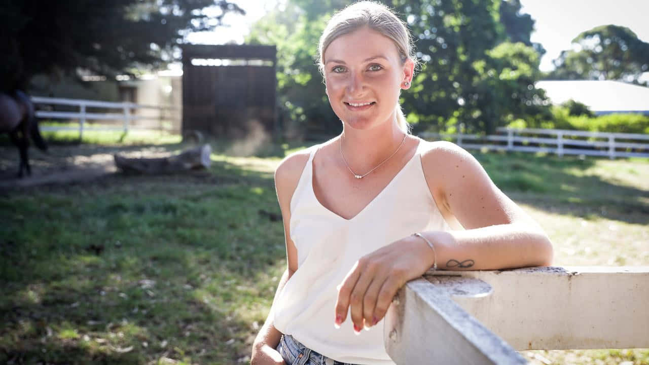 Jockey Jamie Kah Celebrates Racing Success Wallpaper