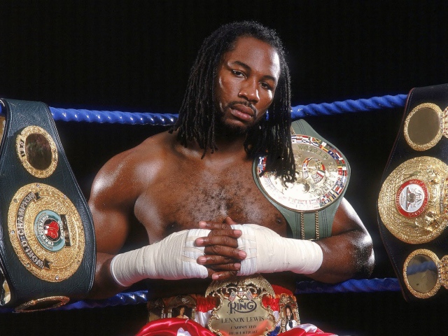 Champion Lennox Lewis And His Belts Wallpaper Image