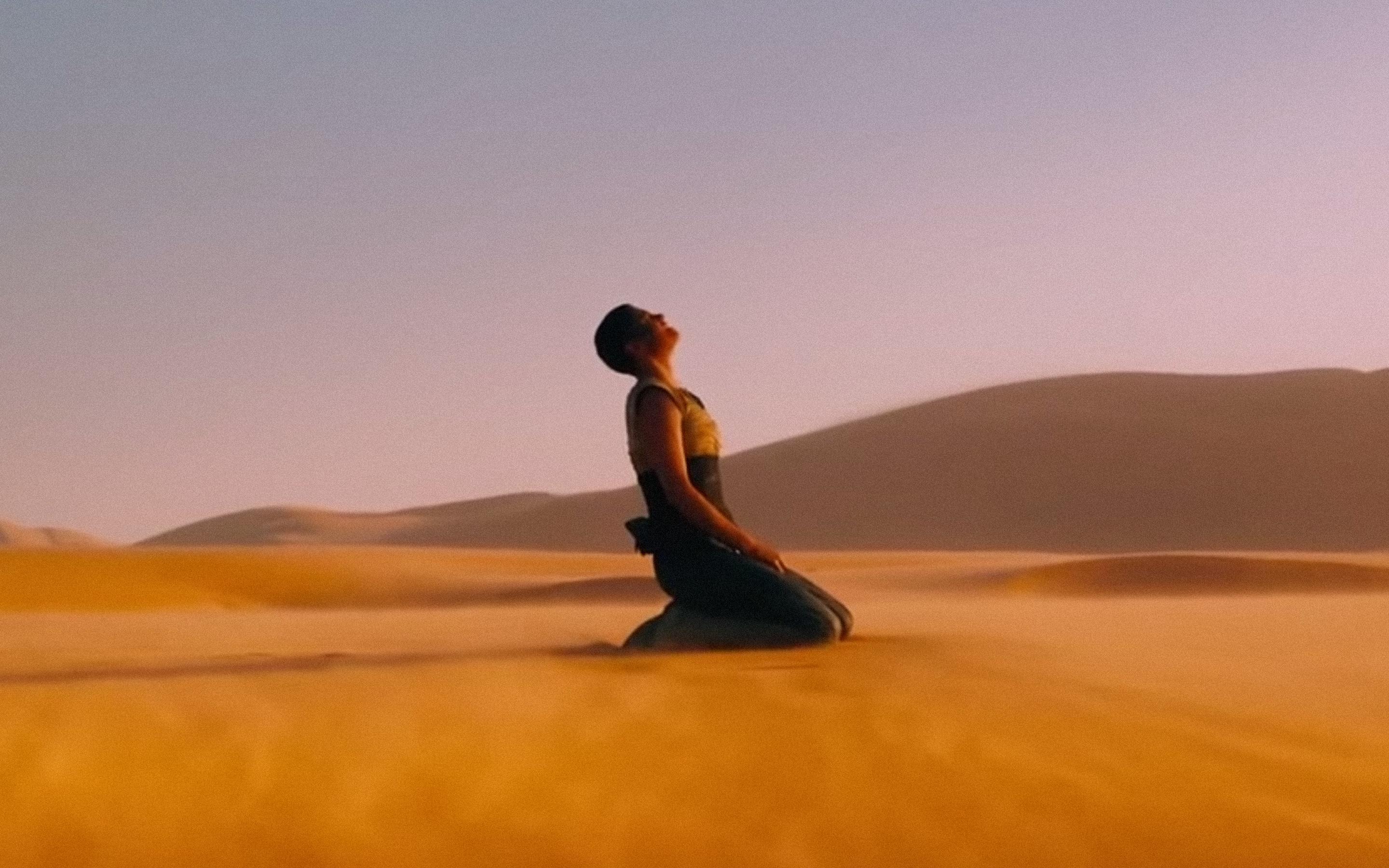 Shot From Mad Max Furiosa In The Desert Wallpaper
