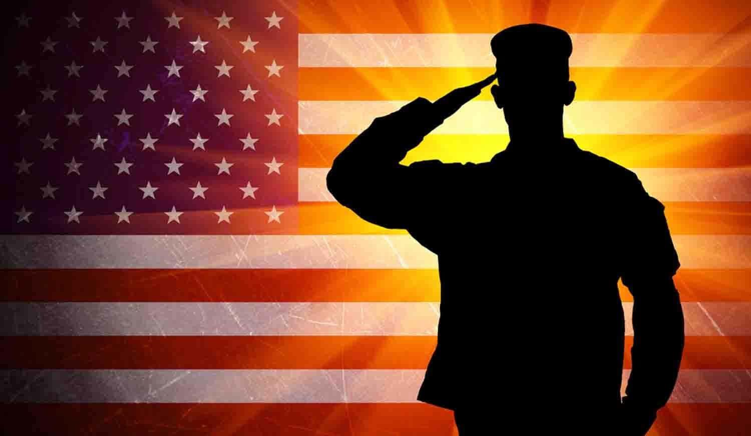 Download A Silhouette Of A Soldier Saluting In Front Of An