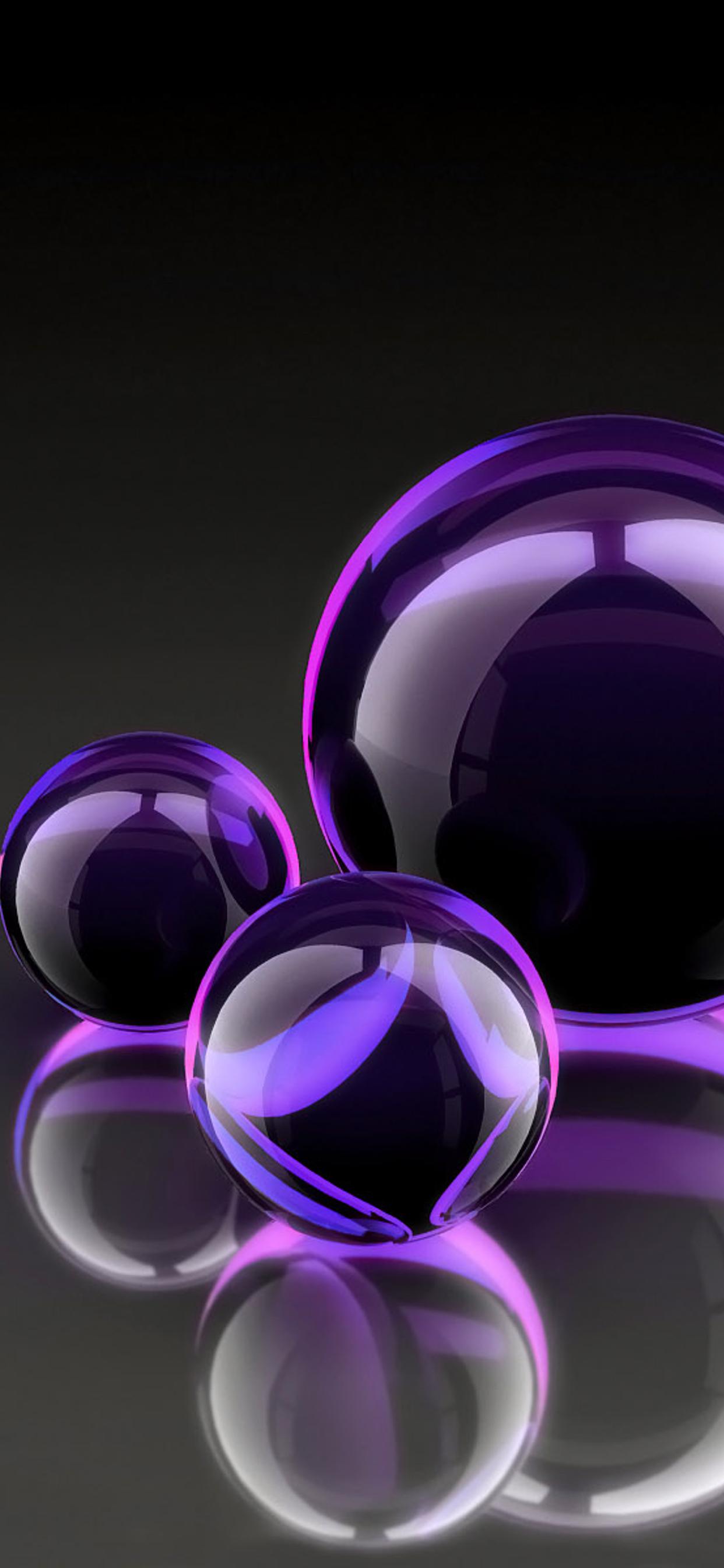Three black and purple balloons of different sizes 1242x2688