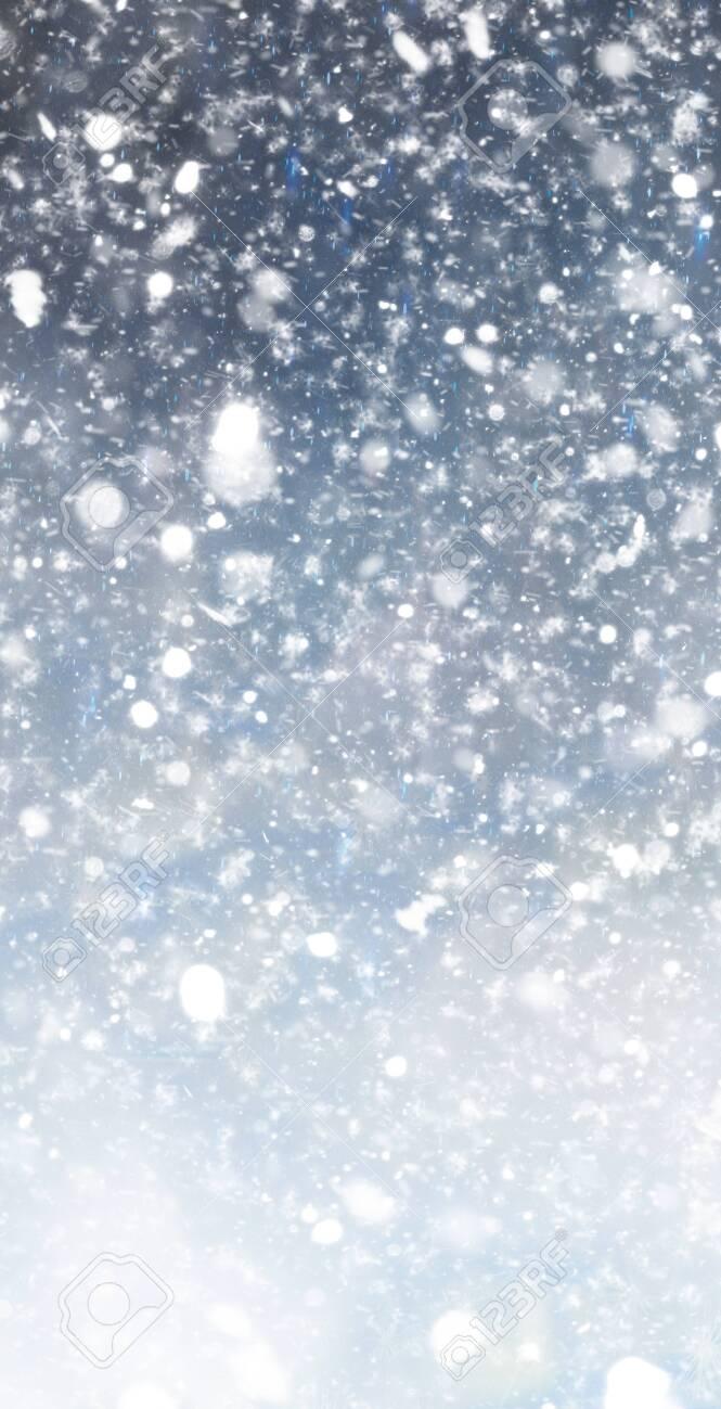 Abstract Winter Christmas Background With Shiny Snow And Blizzard