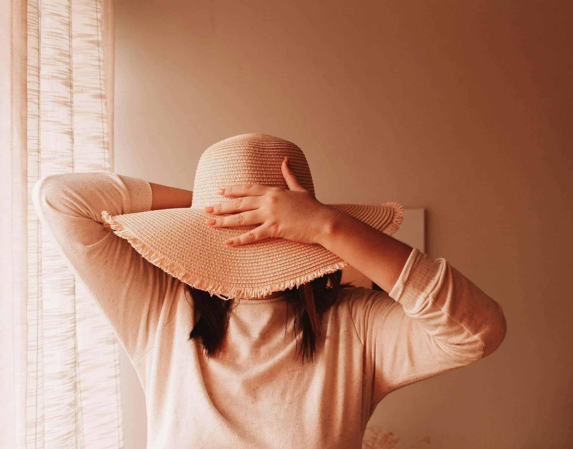 Timid Person Hiding Facewith Hat Yih5og96xll3lrx4 Wallpaper