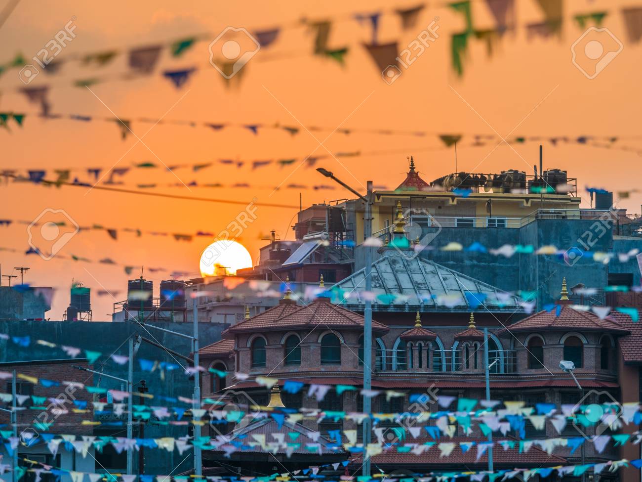 Buildings In Kathmandu Nepal With Orange Sunset On Background