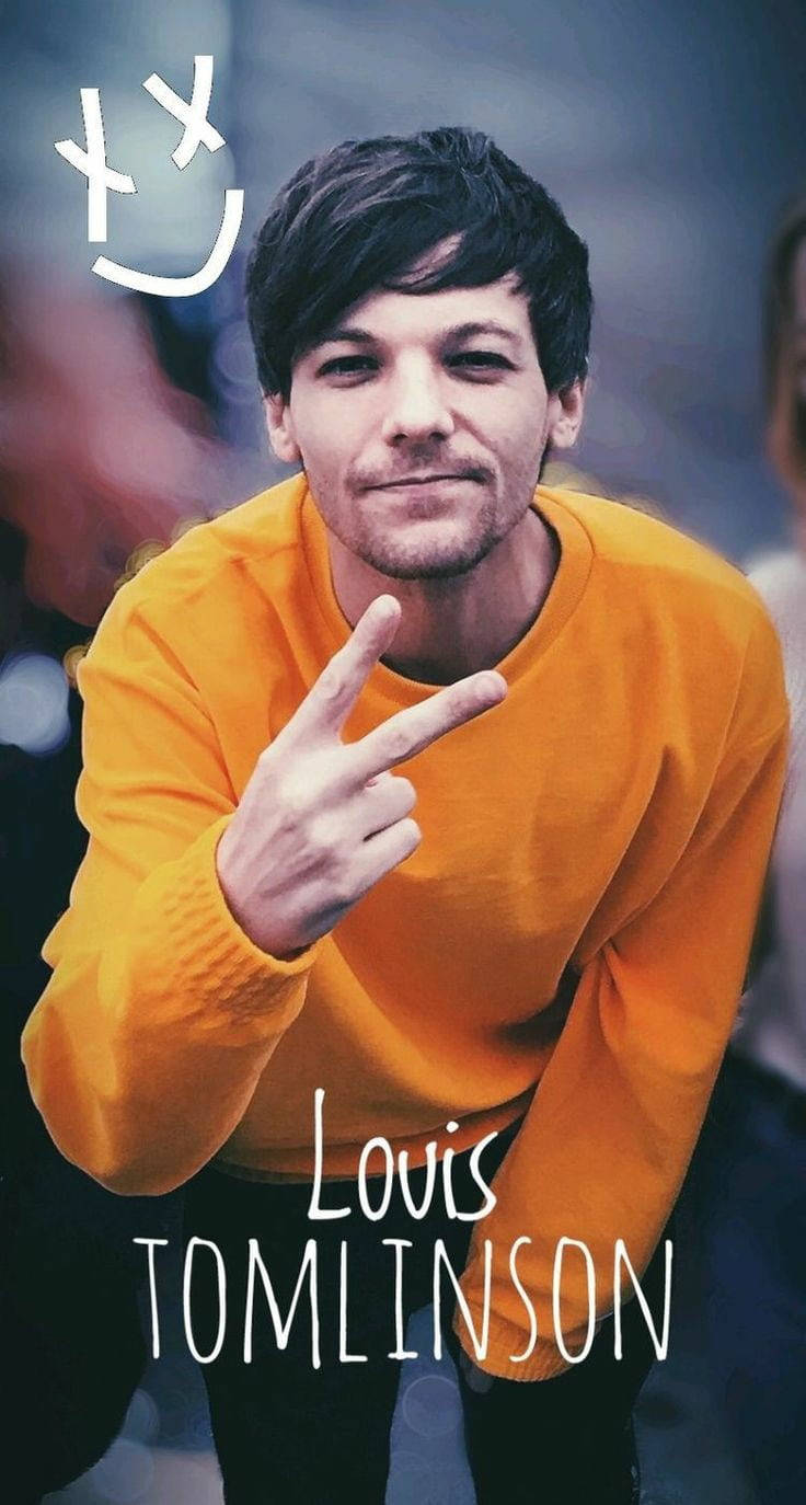 Louis Tomlinson Wearing A Yellow Sweater L8op68agjwvt1an1 Wallpaper