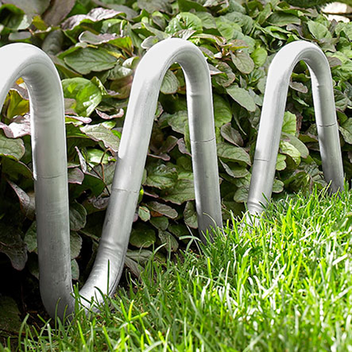 For this sculptural contemporary edging project we used aluminum