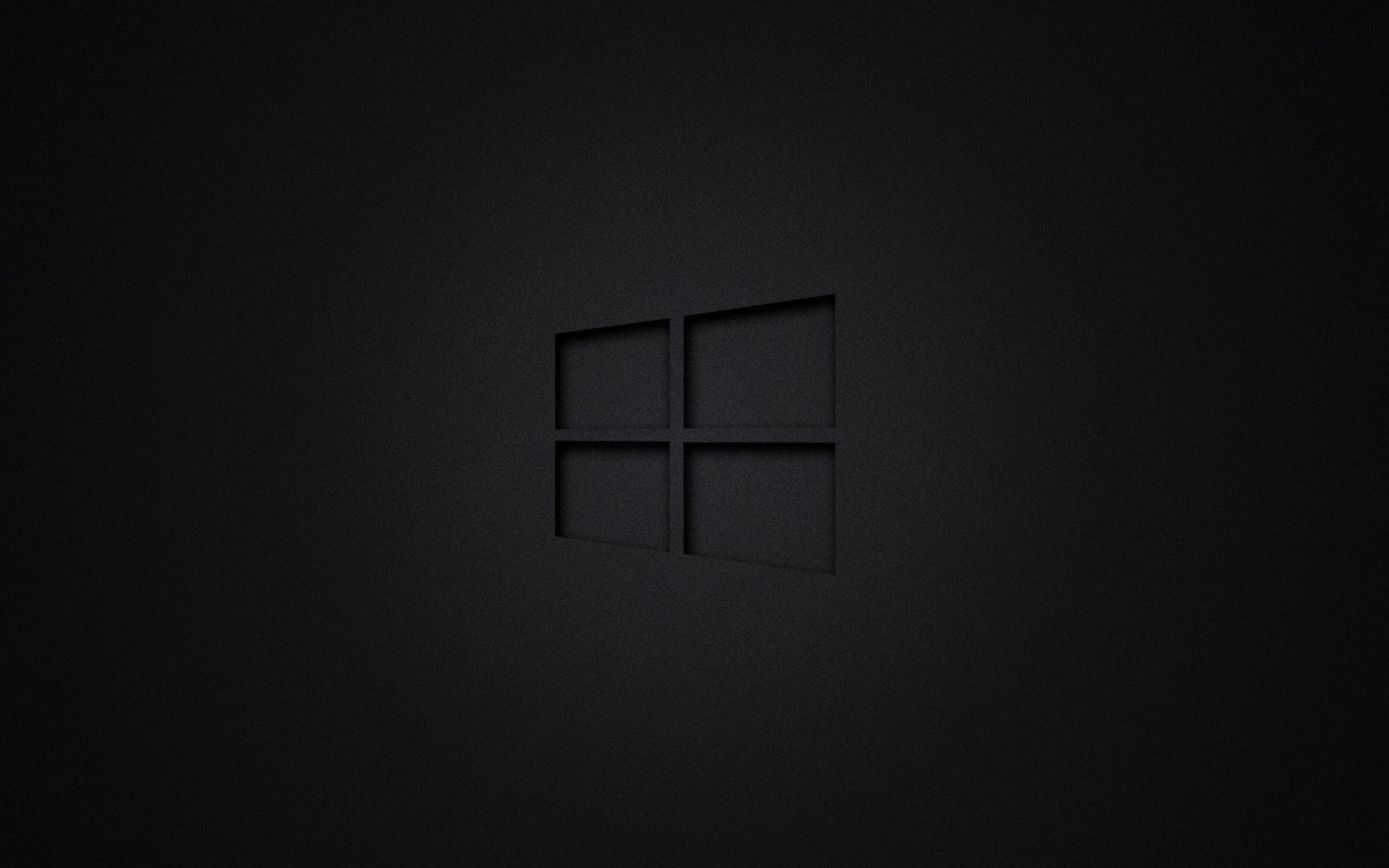 Dark Embossed Windows 10 Logo on a Black Background