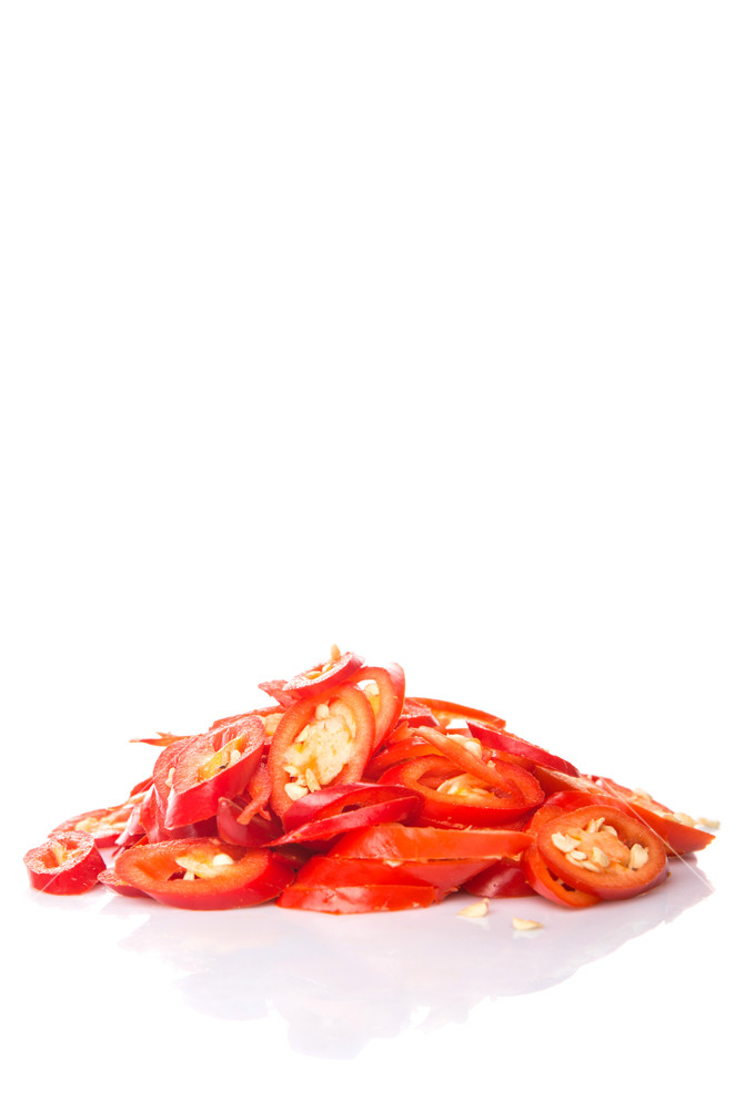 Chopped Red Chilli Over White Background Royalty Stock Image