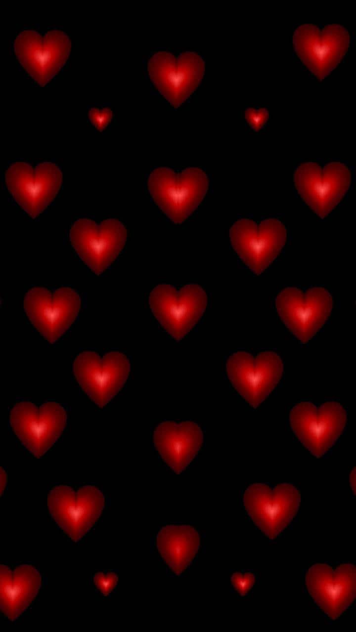 Red Hearts On Black Background Wallpaper