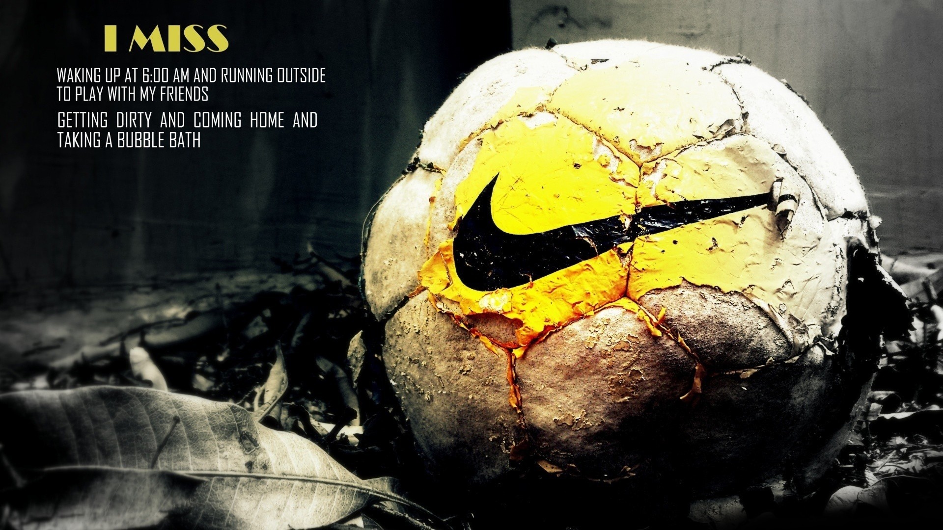 A worn-out soccer ball with a faded Nike logo rests on fallen leaves, evoking nostalgia for childhood play