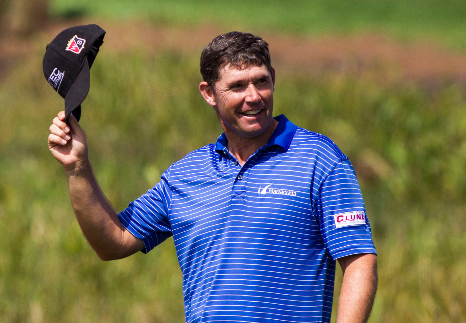 Padraig Harrington Celebrating A Successful Shot On The Golf Wallpaper