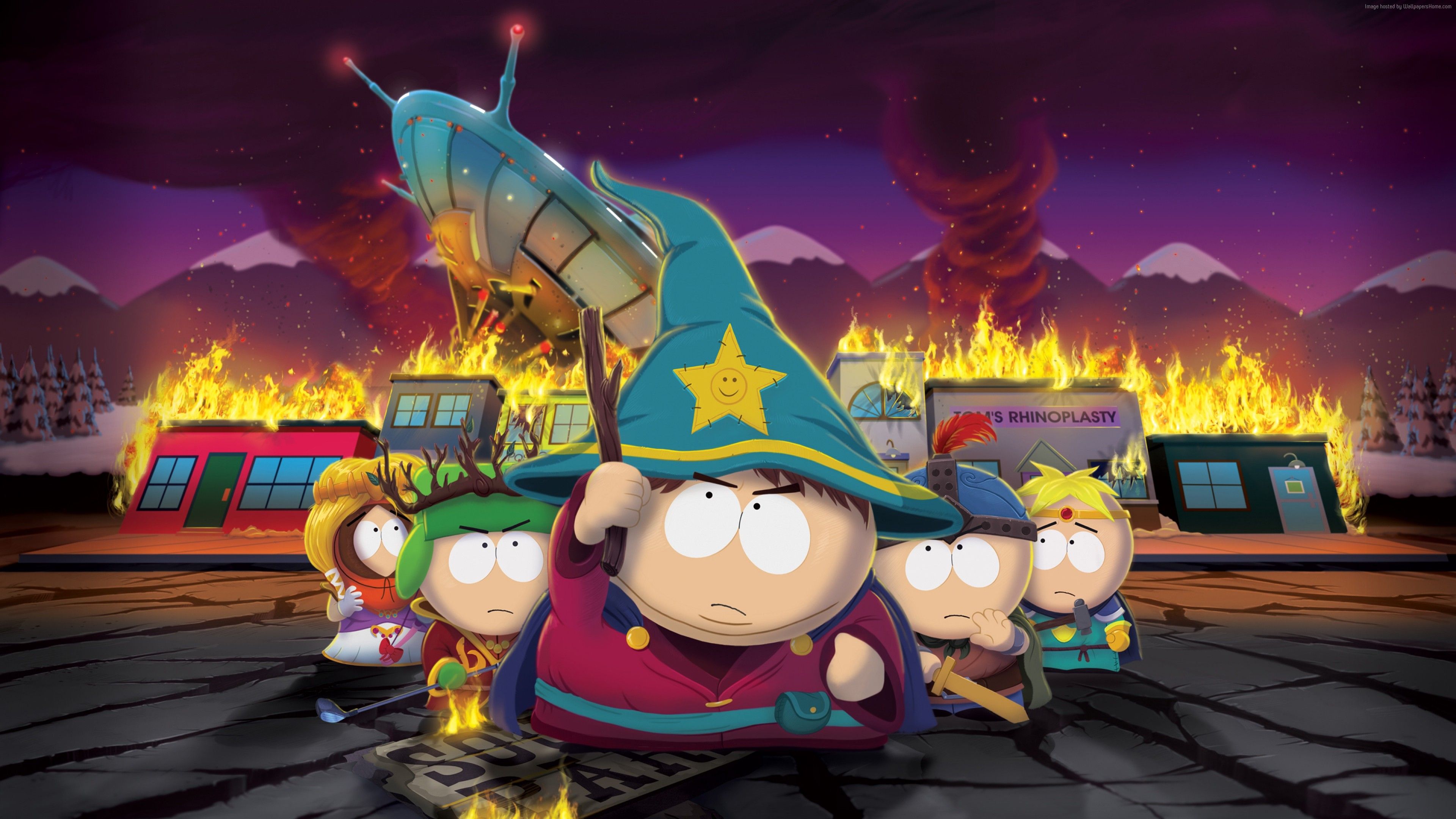 4k wallpaper featuring characters from the animated TV show South Park dressed in fantasy costumes, standing amidst a burning town. A crashed spaceship adds to the chaotic scene