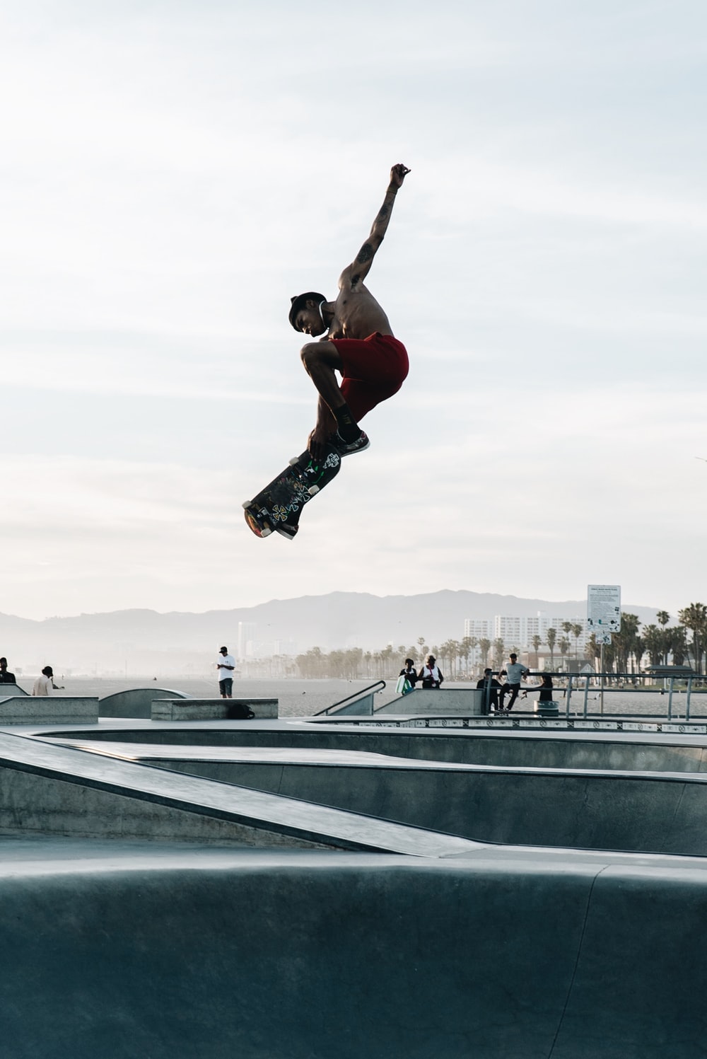 Man Doing Skateboard Tricks Photo Human Image