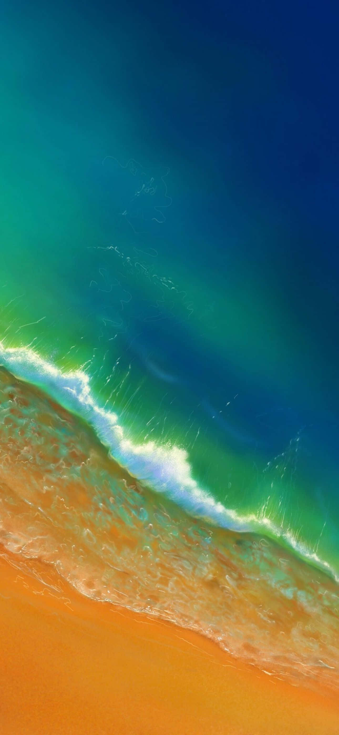 A vibrant aerial view of turquoise waves gently rolling onto a golden sandy beach, perfect for an iPhone 14 Pro Max wallpaper