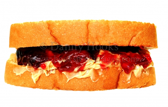 Peanut Butter And Jelly Sandwich Closeup Isolated On White Background
