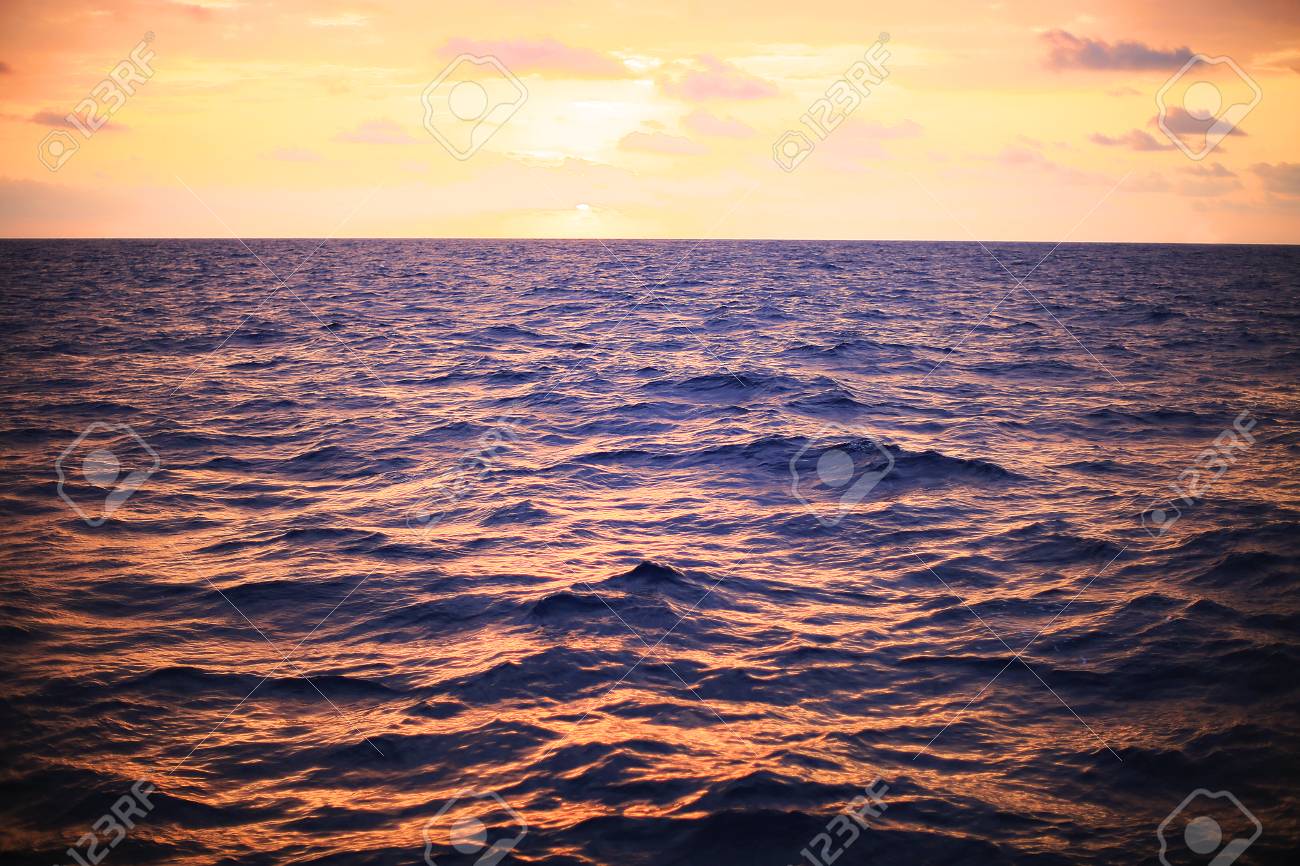 Sea Surface Background In Sunset Or Sunrise Time And Feeling