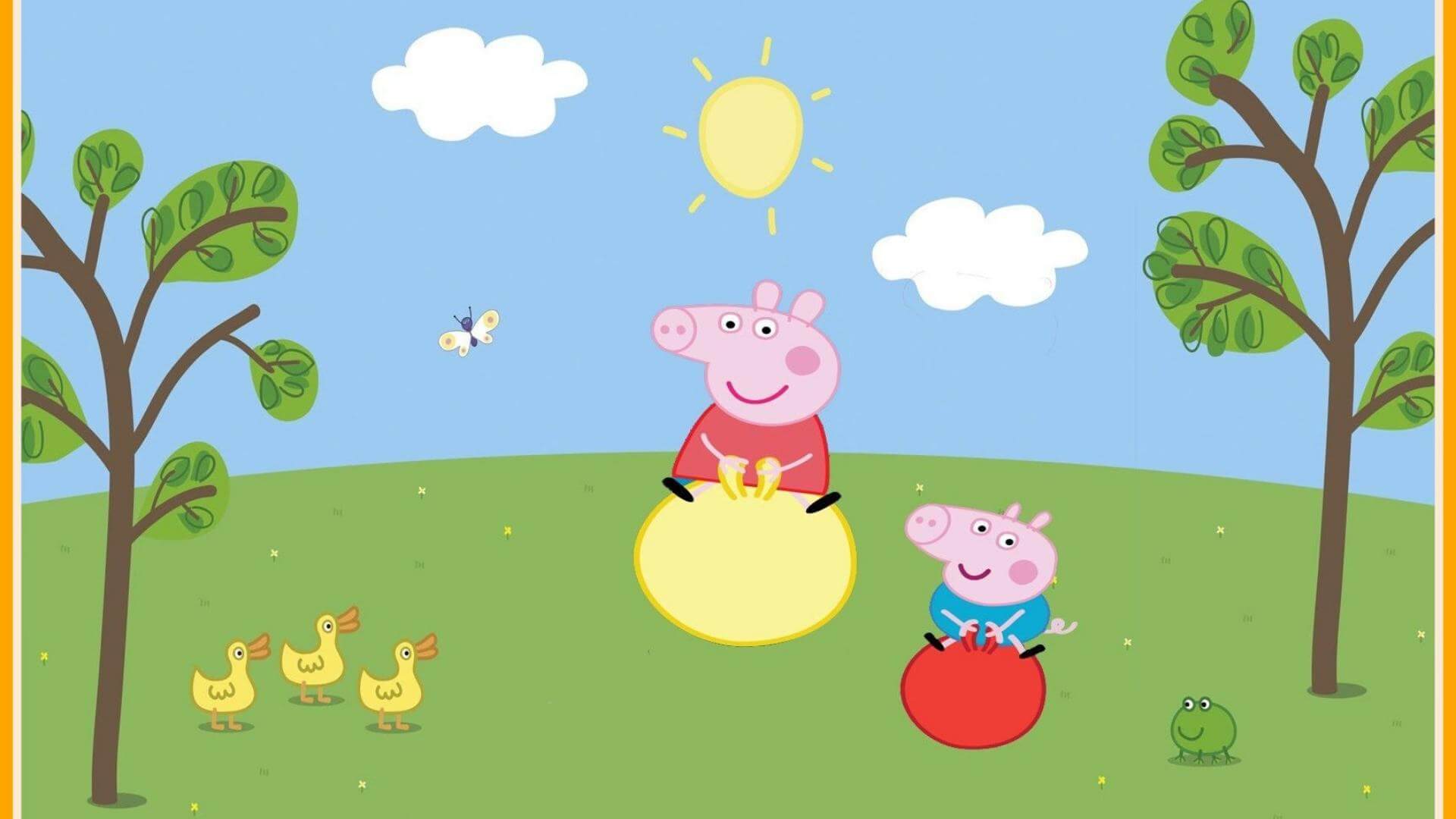 Peppa Pig and George playing outdoors on bouncy balls