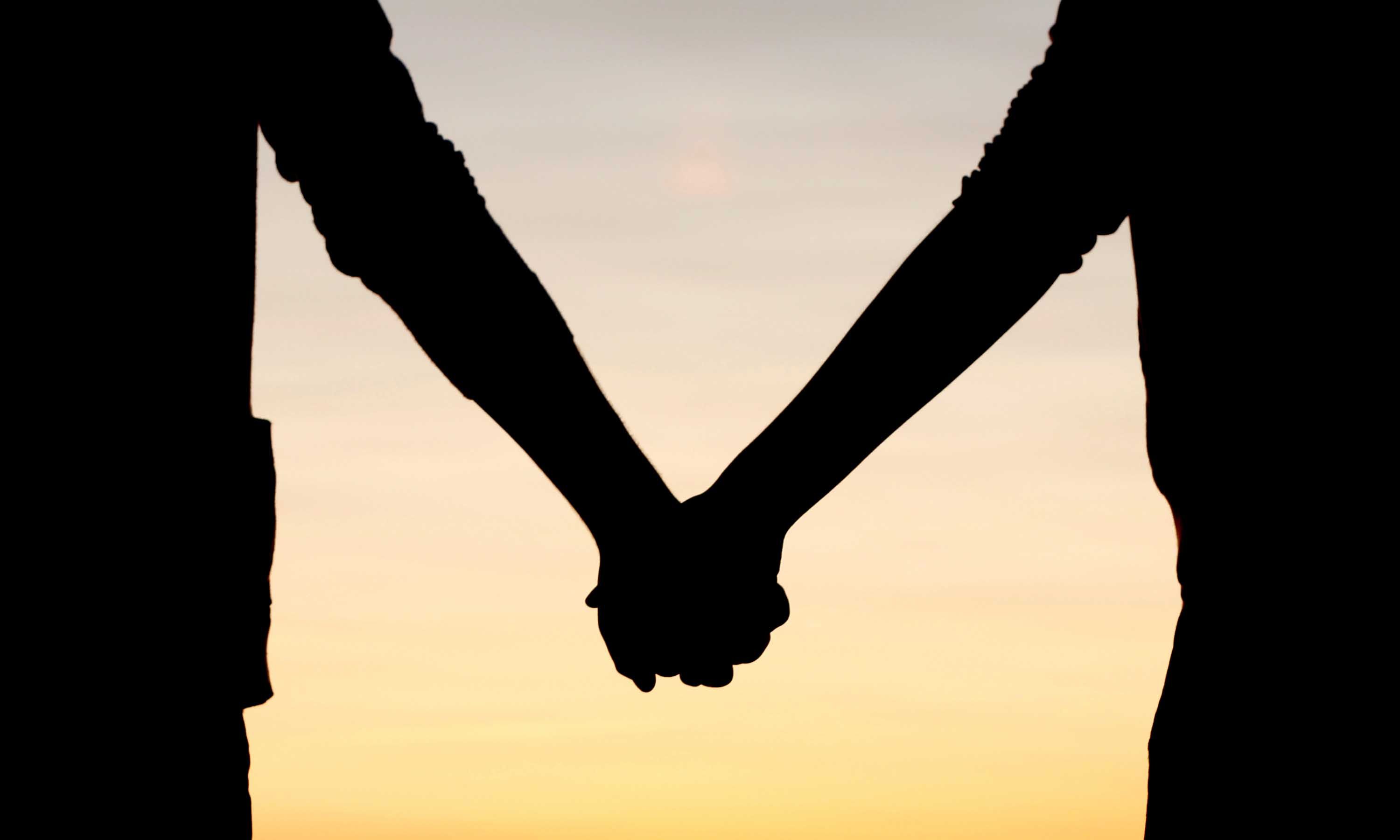 Couple Holding Hands Wallpaper On