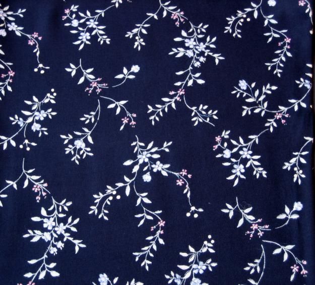 White Floral Pattern On Navy Background